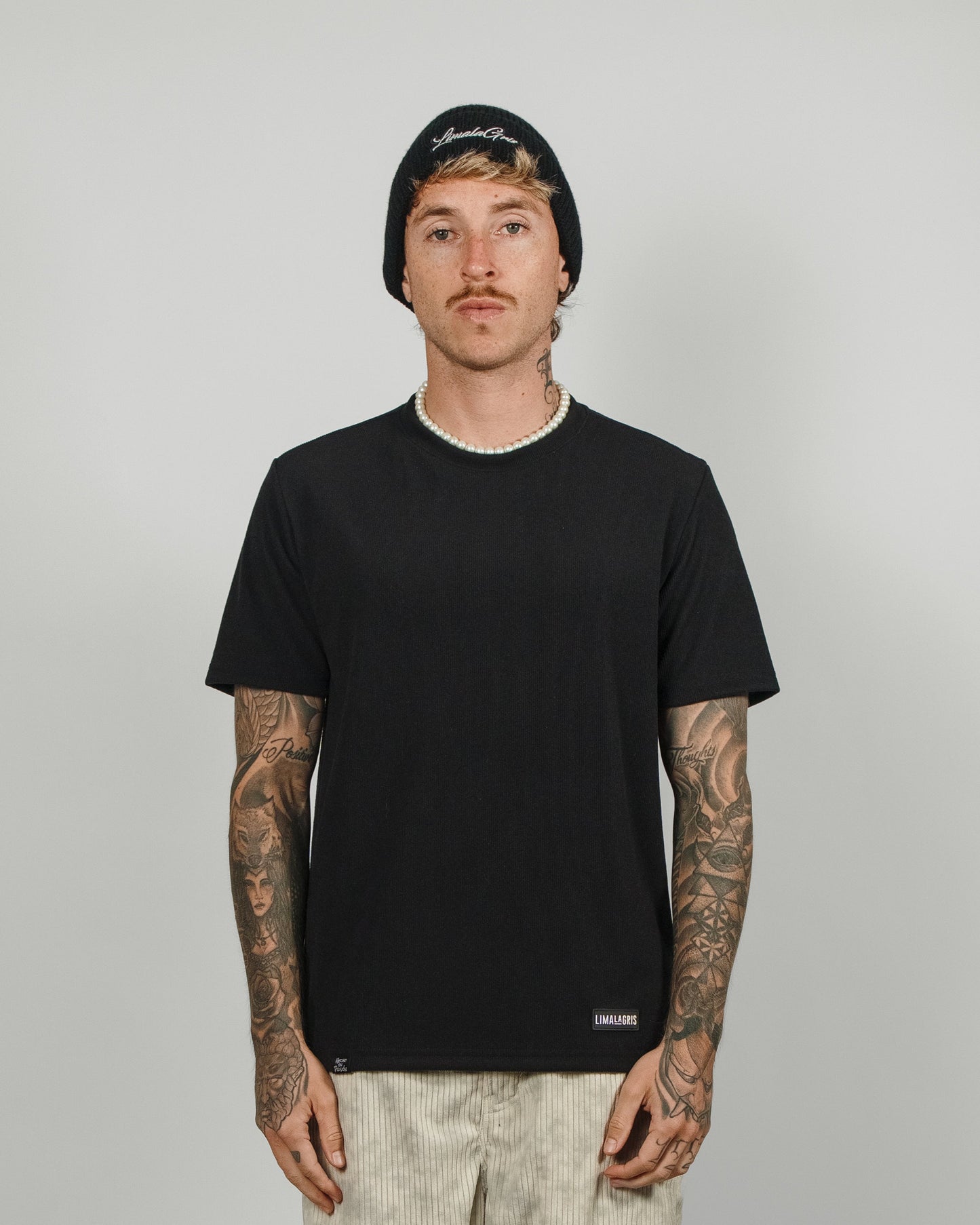 CAMISETA TEJIDA - NEGRA